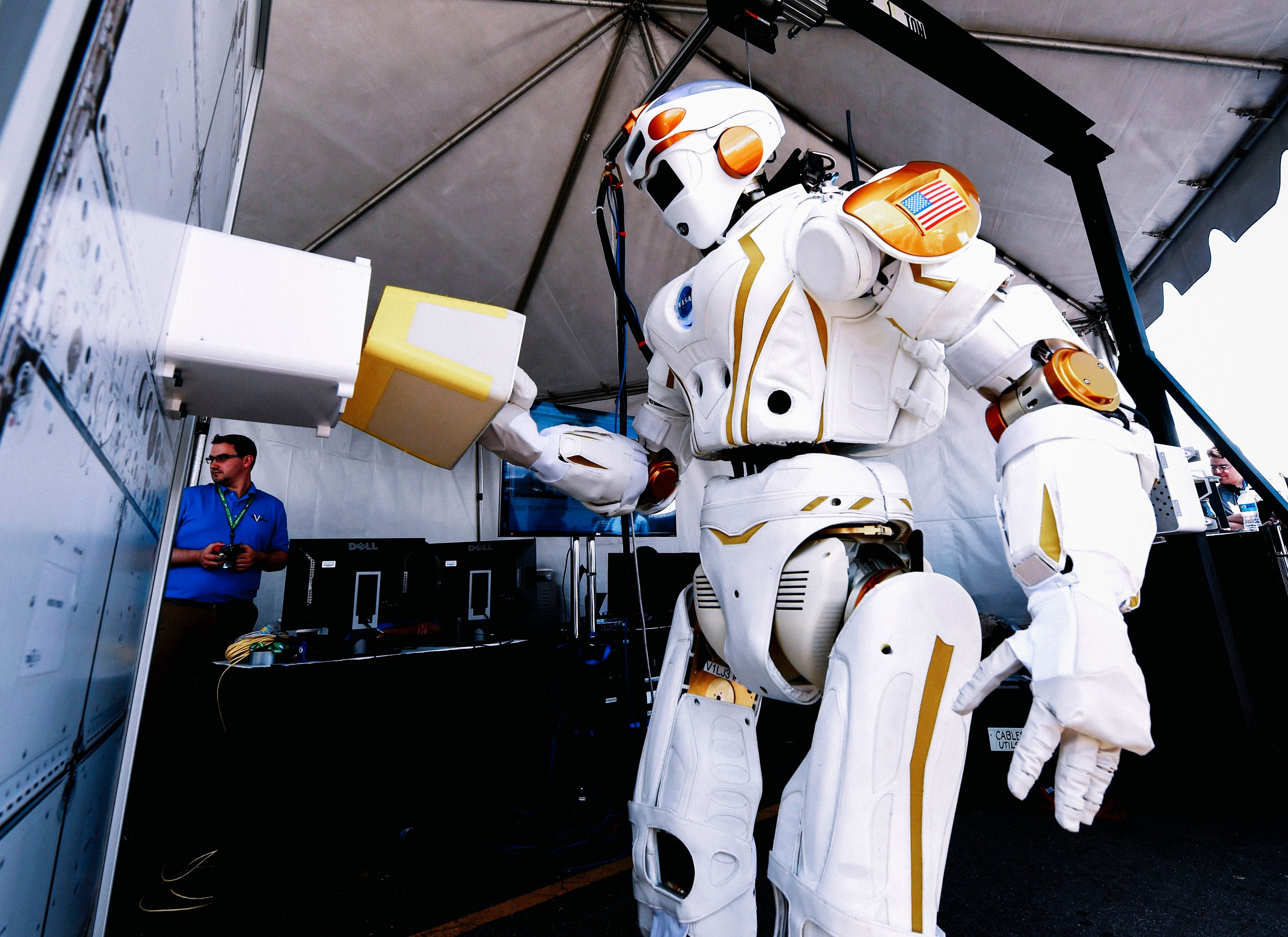 How are robots helping with space colonization?